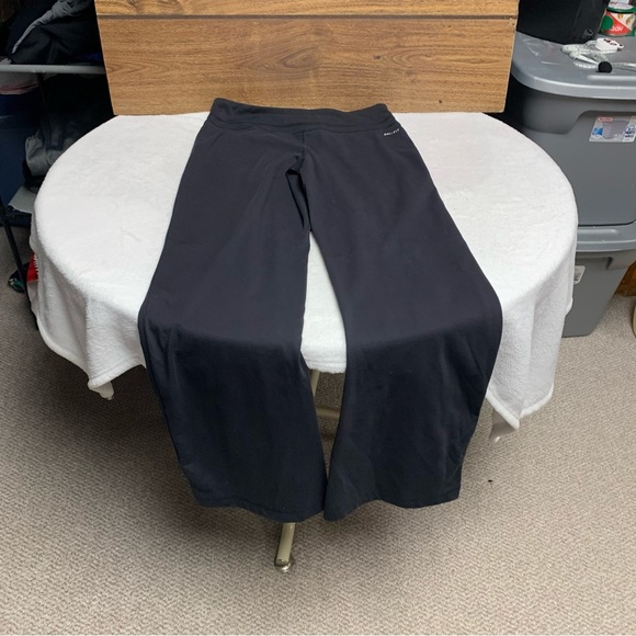 Nike Dri-fit black athletic pants size M white swoosh on front - Picture 8 of 8